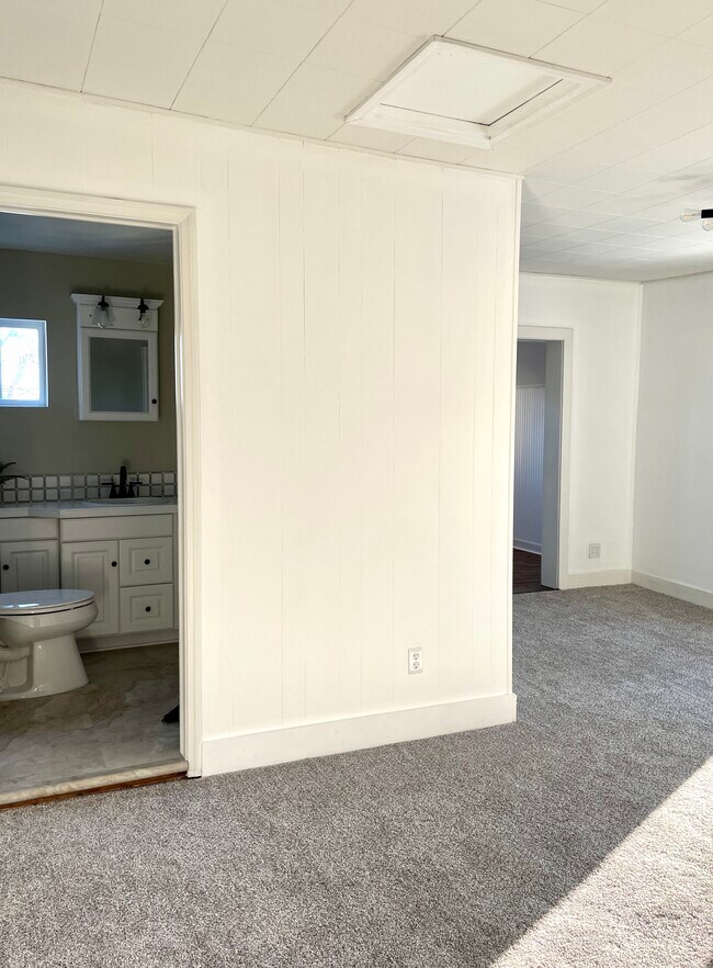 Bathroom with new flooring, shower door, fixtures and tile - 432 Webster St