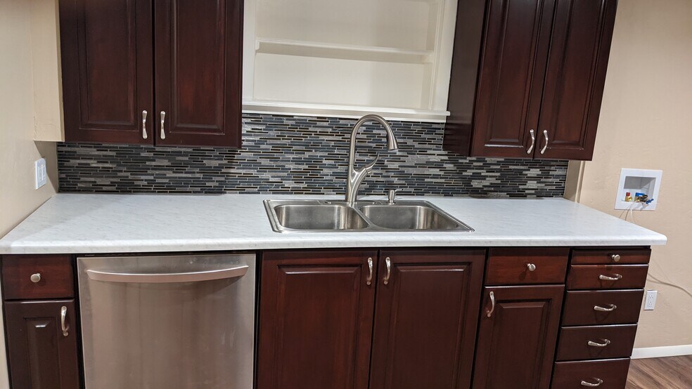 New cabinets and hands free sink - 7976 W 2820 S