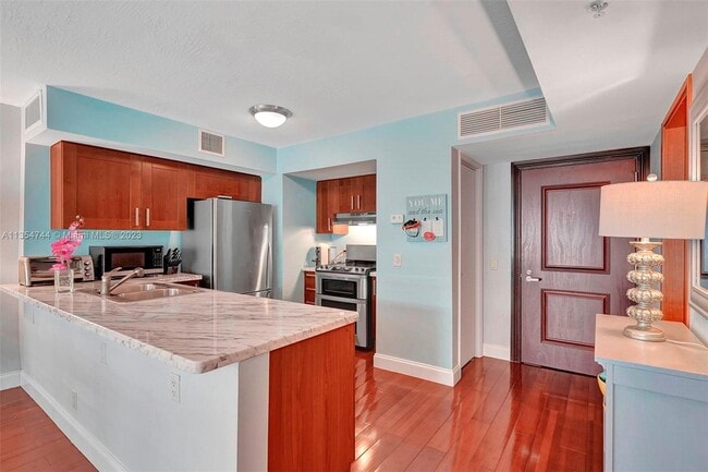 Building Photo - 9499 Collins Ave