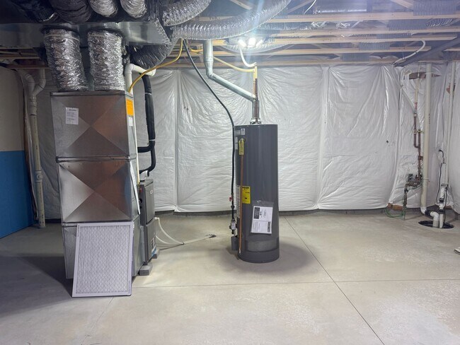 Building Photo - Spacious 4-Bedroom Ranch with Finished Basement & 3-Car Garage