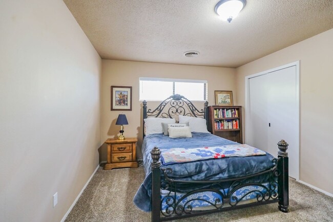 Building Photo - Three Bedroom Home with Plush Backyard