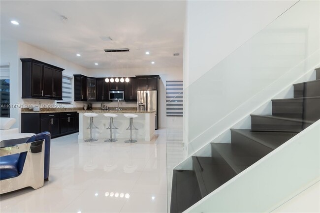 Building Photo - 9735 W 34th Ct