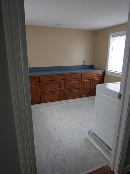 Laundry room off living room - 55 Makara St