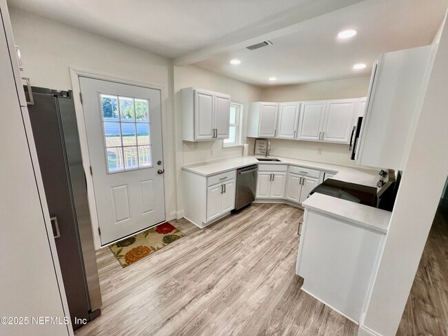Building Photo - 9720 Jupiter Ct S
