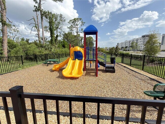Building Photo - 5563 Millennia Park Dr