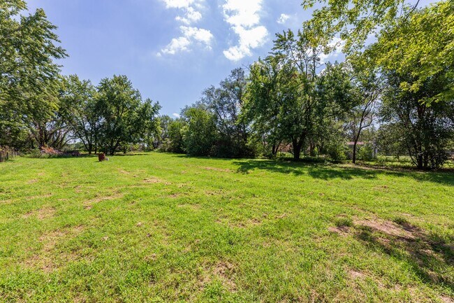 Building Photo - Updated mobile home on acre lot with garag...