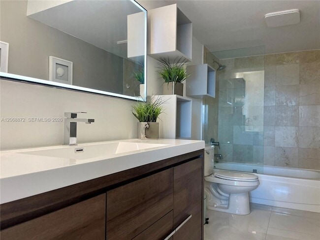 Building Photo - 10275 Collins Ave