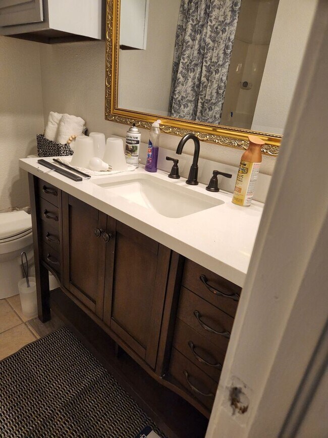 Building Photo - Updated 3-Bedroom with Vaulted Ceilings and Corner Lot Charm