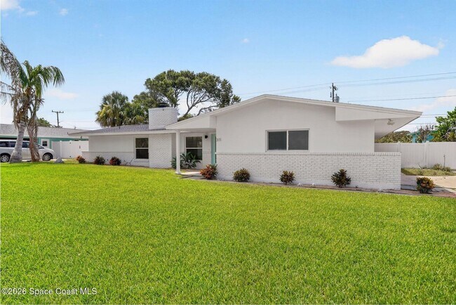 Building Photo - Welcome to this beautifully remodeled 4-bedroom, 3-bath home in the heart of Indialantic Beach!