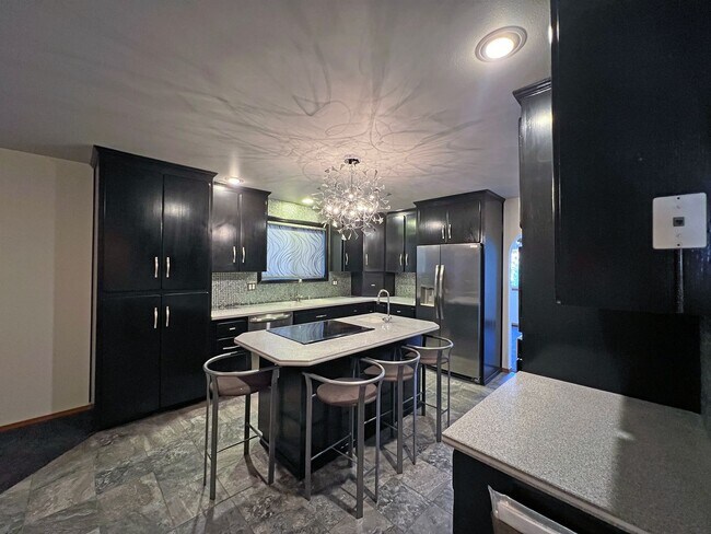 Building Photo - Stunning 4 Bedroom 2.5 Bath with Peek-a-Boo View of Puget Sound