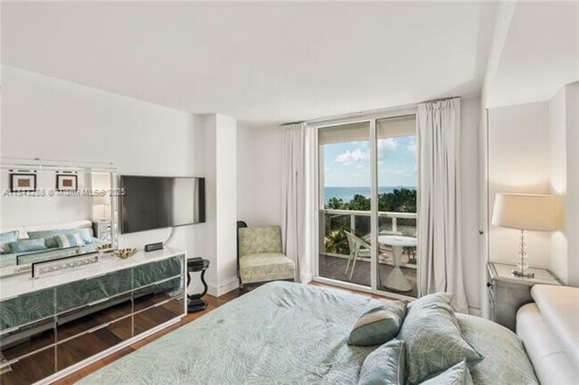 Building Photo - 10275 Collins Ave