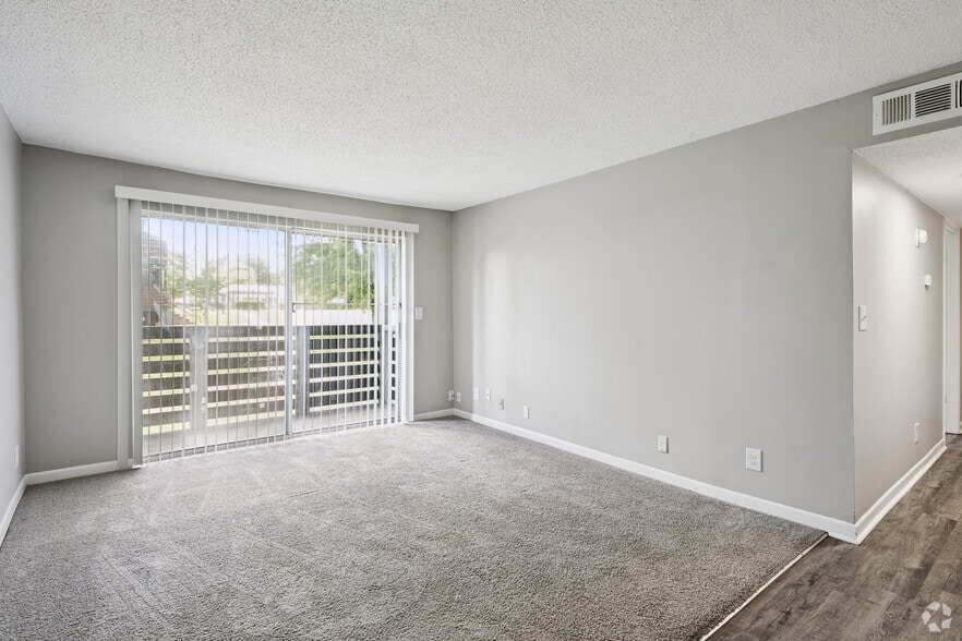 2BR, 1BA - 975SF - Living Room - The Raintree Apartments