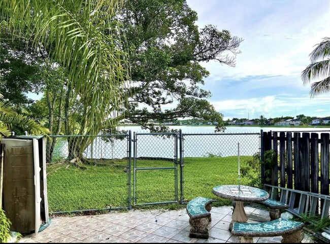 Patio overlooking the lake and green areas - 13918 SW 172nd Ter