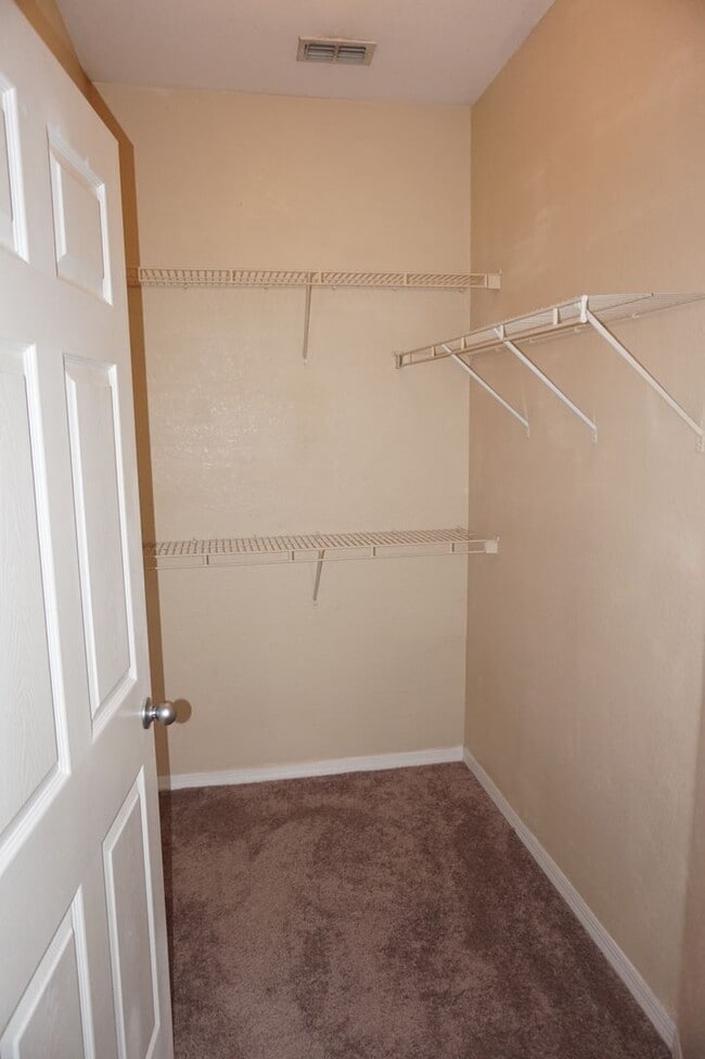 Building Photo - 8103 Lillies Way