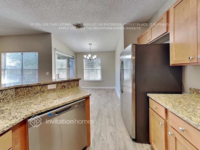 Building Photo - 12370 Carriann Cove Trail S