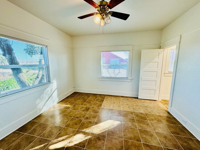 Building Photo - Country-style home with 3 bedrooms, Upstairs Den/Office, 2 baths offering a charming and peaceful...