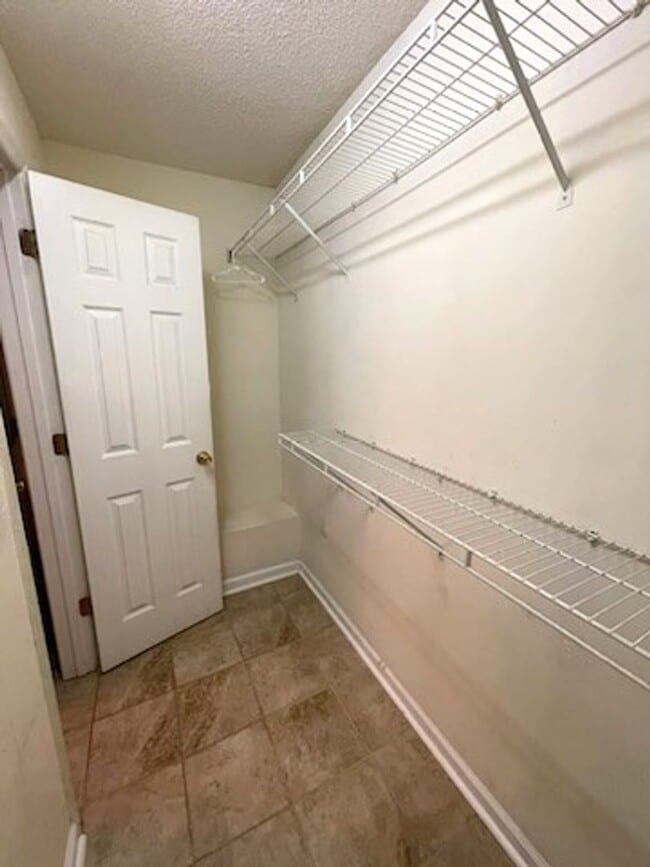 Building Photo - Freshly Painted! New Luxury Vinyl Plank Fl...