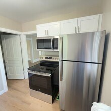 Building Photo - Two Bedroom Upper Apartment in Walker!