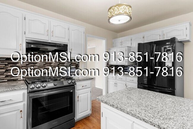 Building Photo - Welcome home to this charming two-story in South Woods subdivision