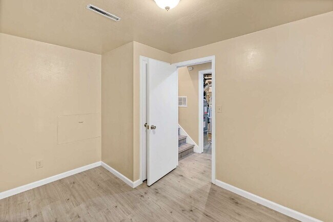 Building Photo - 3-Bedroom with A Flex Room Multi-Level Home with Fresh Paint, Refreshed Deck, and Multiple Living...