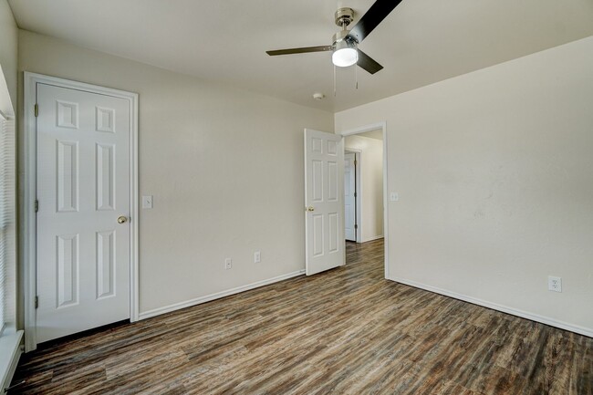 Building Photo - Spacious 4-Bedroom Home with Corner Firepl...