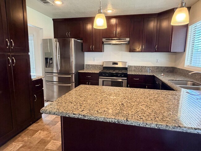 Building Photo - Move-In Ready Rosamond 3BR/2BA Home w/ Landscaping + Garage + Upgrades!