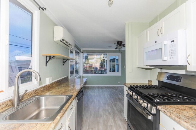 Building Photo - 2 Bedroom, 1 Bathroom, 2 Parking Home with Solar Panels + A/C!