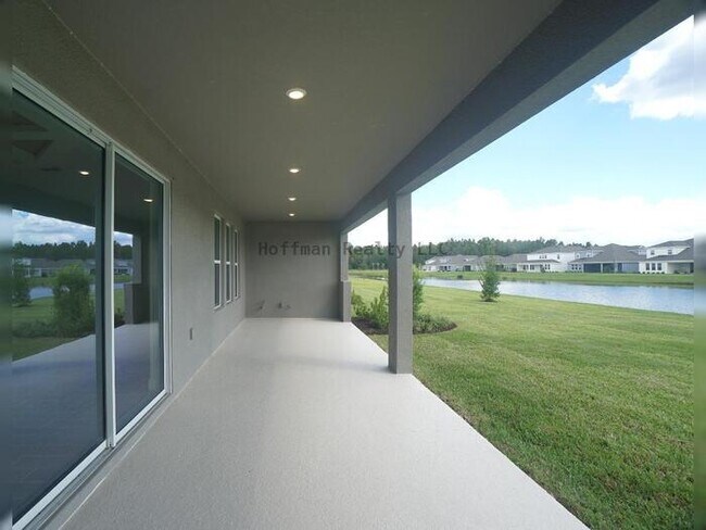 Building Photo - Stunning 5-Bedroom Lakeview Home in River Landing, Wesley Chapel