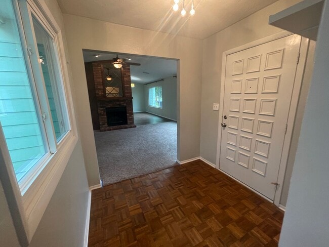 Building Photo - 3/2 (Northwood Oaks) Beautiful split floor plan home with custom brick accents and large landscap...