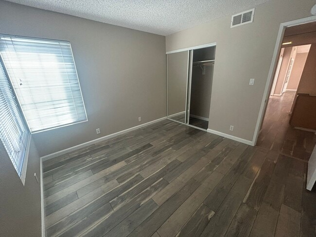 Building Photo - Upper-Level Condo – Bright, Stylish, and Ideally Located!