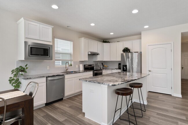 Building Photo - 6724 Cat Singer Cir