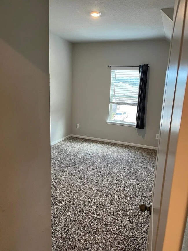 Building Photo - Four bedroom home with dedicated home office, game room, 2.5 bathrooms, and fenced yard in Fairwa...