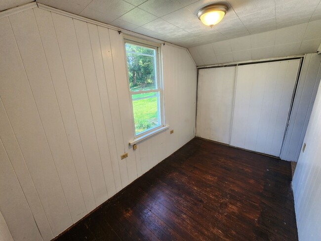 Building Photo - 4 BR home with first-floor living, new roof, and a private-feeling backyard in Lincoln Place