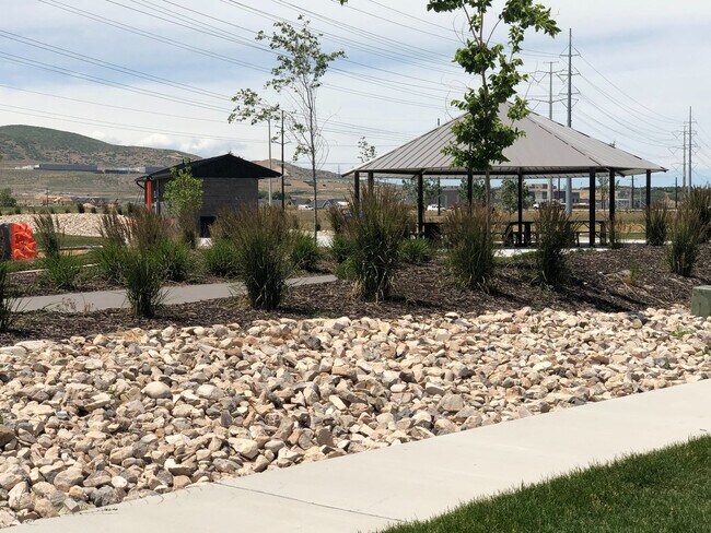 Building Photo - AMAZING HOME IN SOUGHT AFTER EXCHANGE DEVELOPMENT W/ 2 CAR GARAGE