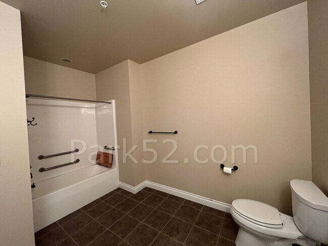 Building Photo - $250 Off First Full Month! 1 Bed 1.5 Bath Theater District Condo + Amenities
