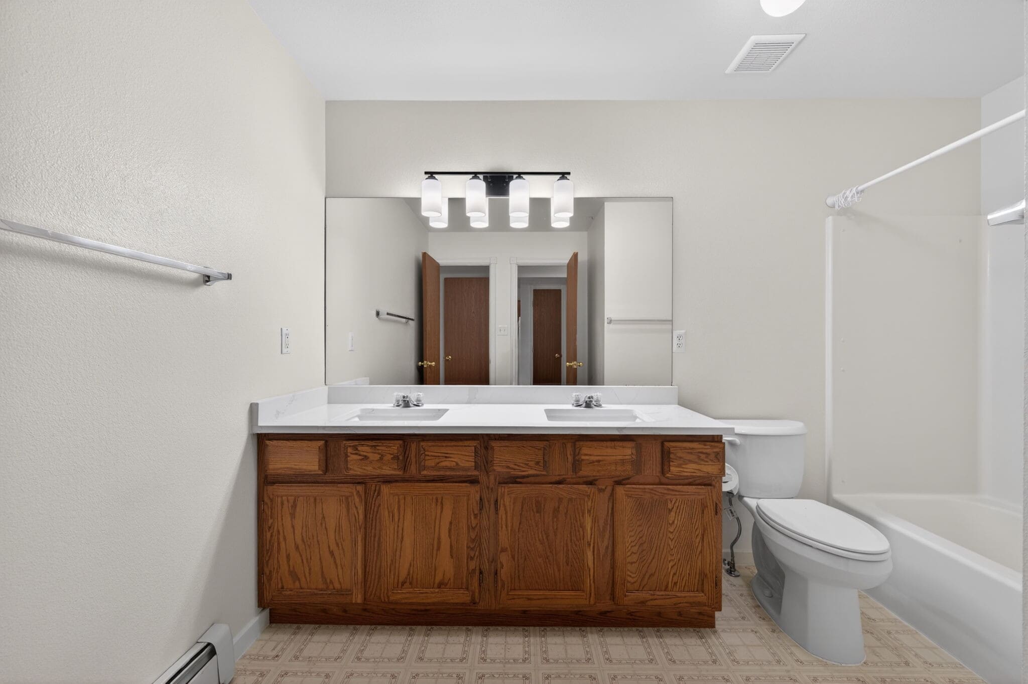 large vanity with double sinks - 4502 E 12th St