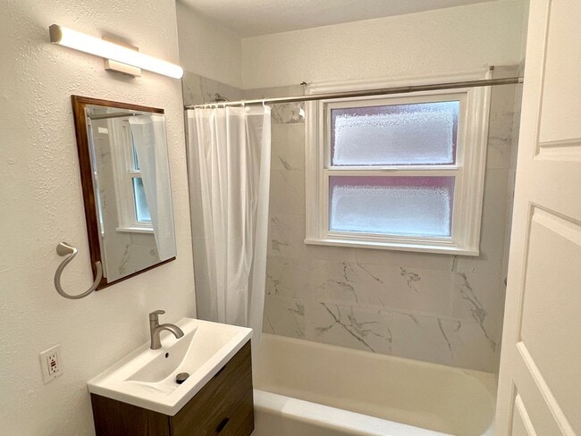 Building Photo - This beautifully updated home offers a bri...