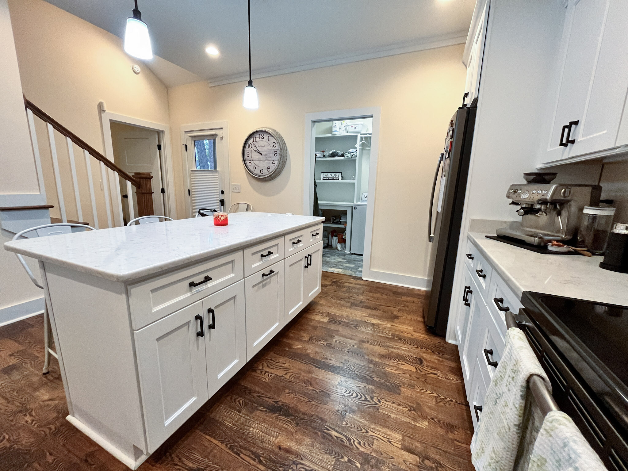 Island in kitchen, view of laundry room - 426 Sheldon Rd