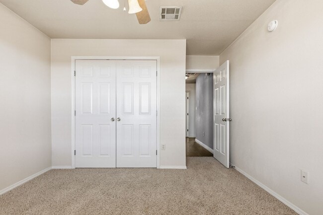 Building Photo - 4 Bedroom 2 Bath with Solar on a Large Corner Lot