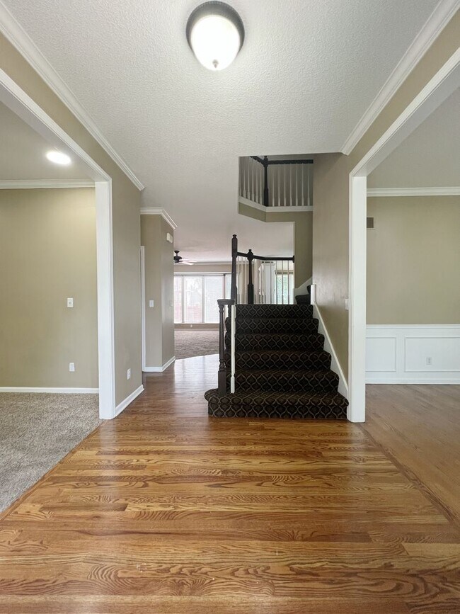 Building Photo - SEE IT NOW: Spacious 4-Bed Home with Finis...