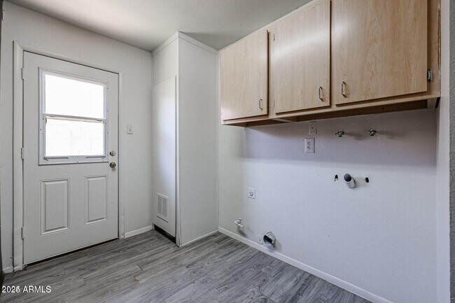 Building Photo - 5333 W Port Au Prince Ln