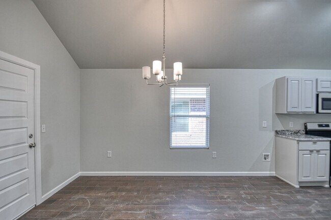 Building Photo - New Construction in Varenna Landing! Storm shelter and lawn care included!