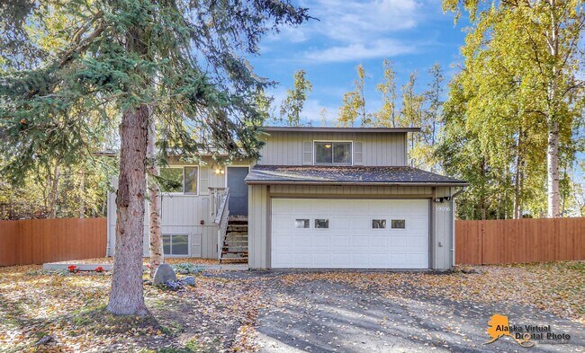 Building Photo - Eagle River Home w/ Fenced Yard, Sunroom, and Garage!