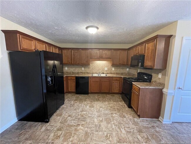 Building Photo - 5234 Woodpecker Dr