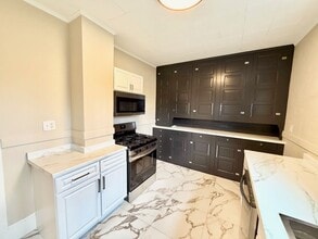 Building Photo - Updated 3-Bedroom Home on Tree-Lined Street with Off-Street Parking