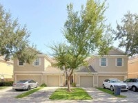 Building Photo - 9818 Fan Palm Way