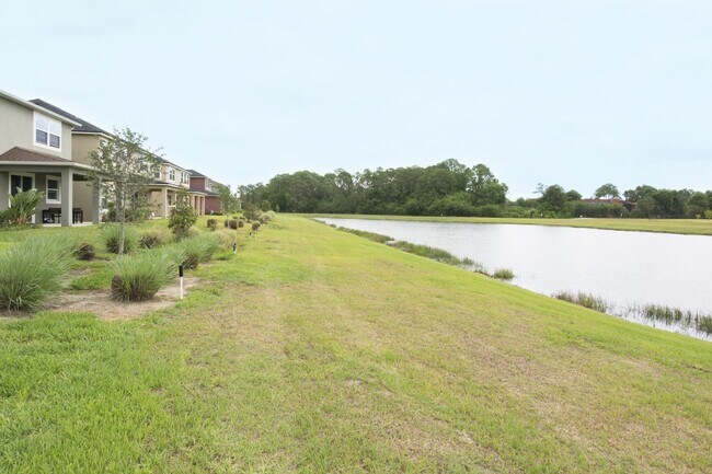 Building Photo - BEAUTIFUL LAKE VIEW AND CORNER LOT HOME WI...