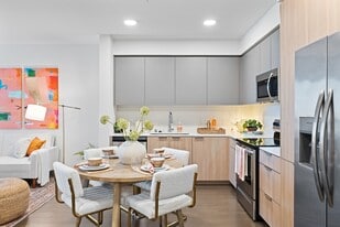 Cook, dine, and unwind in this beautifully designed modern kitchen and dining space, where style meets everyday functionality. - The Grant
