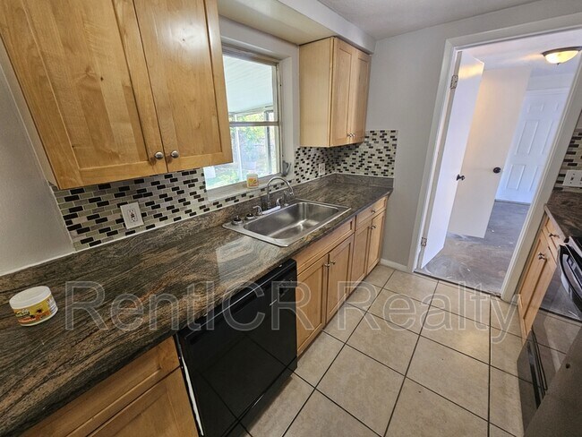 Building Photo - 7734 Candle Dr