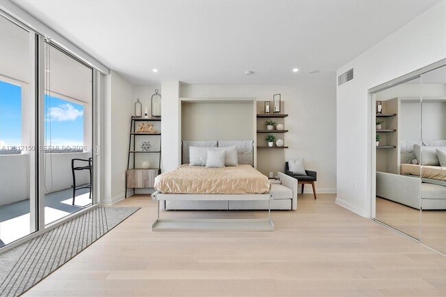 Building Photo - 10275 Collins Ave